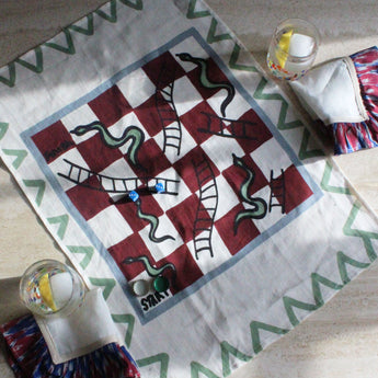 Amuse La Bouche Tea Towel • Snakes and Ladders